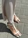 Босоніжки жіночі шкіряні світло-бежевого кольору на підборах 37 (24 см)