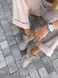 Кросівки жіночі шкіряні кольору латте зі вставками замші