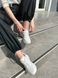 Кросівки жіночі шкіра флотар білого кольору з перфорацією на товстій підошві