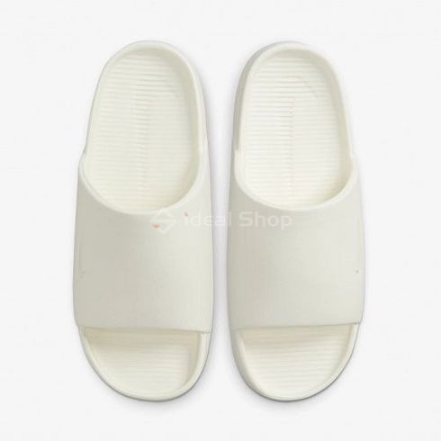 Фото Женские шлепанцы W NIKE CALM SLIDE DX4816-100 196607813973 1