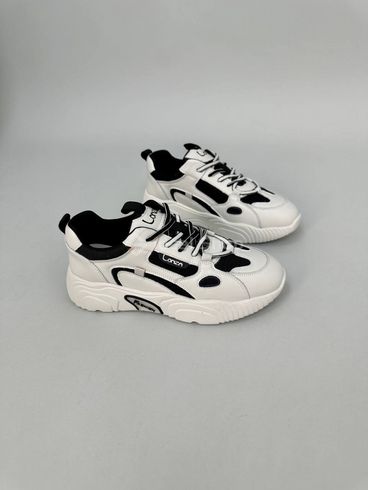 Кросівки жіночі шкіряні світло-бежеві з чорними вставками сітки 38 (24 см)