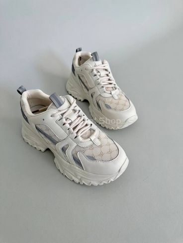 Skórzane białe sneakersy damskie z tekstylnymi wstawkami 36 (23 cm)