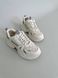 Skórzane białe sneakersy damskie z tekstylnymi wstawkami 36 (23 cm)